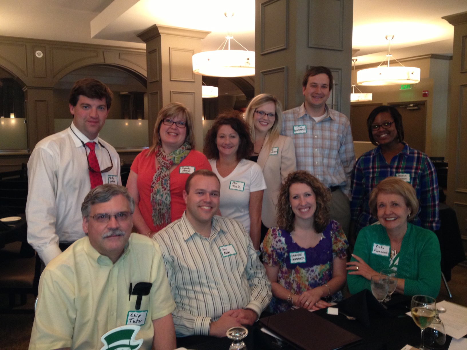 PHOTO:  Front Row (L to R): Chip Tatum, Joel Mosby, Laura Lee Grommersch, Vicki Fioranelli. Back Row (L to R) Brady Stanford, Mandy Morse, Mia Fioranelli Tuttle, Kate Kinnison Van Namen, Tim Grommersch, and Jessica Johnson at the Memphis chapter planning meeting at the Racquet Club in Memphis.